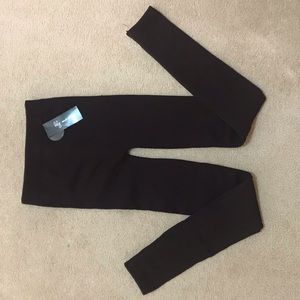 Lily Morgan dark purple Cozy fleece lined leggings with cable knit pattern.